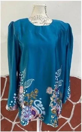 Contoh baju kurung moden wanita berwarna biru